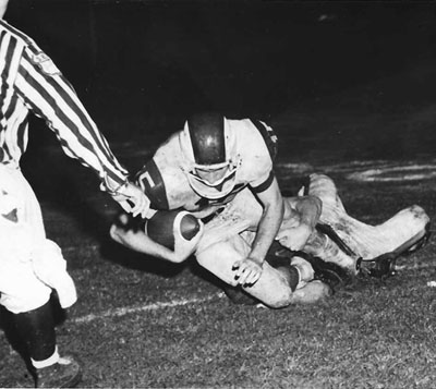 Desportes tackled by Easton.